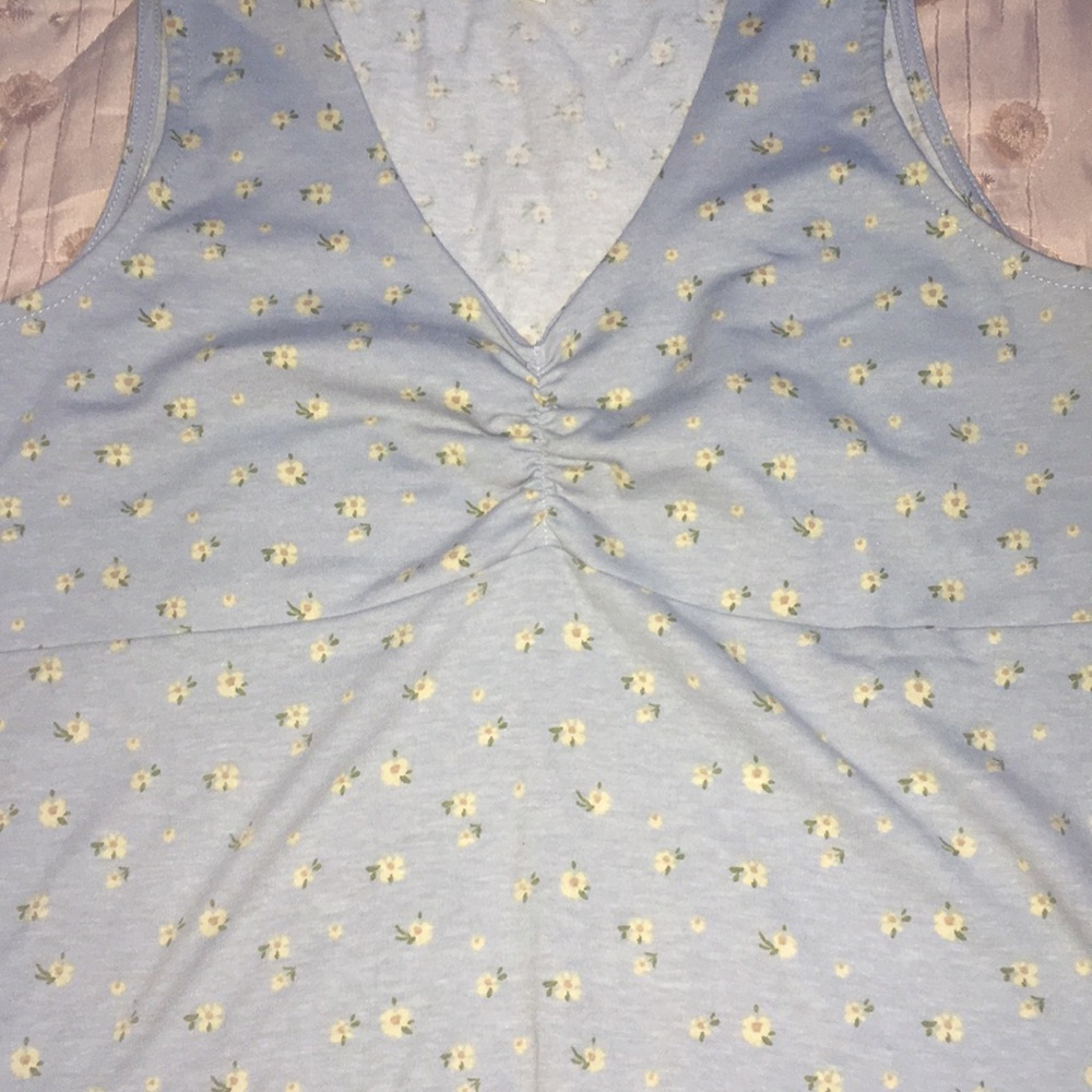 Selling a floral cropped shirt